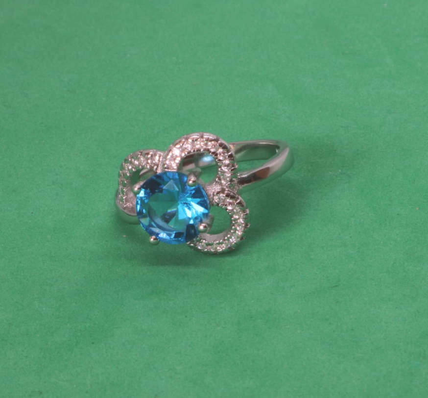 An06 Anillo Flor Piedra Celeste